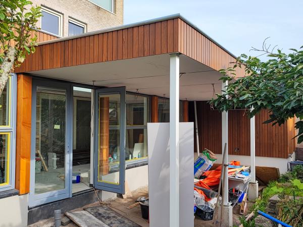 Aanbouw aan woning en buitenberging