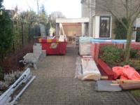 Aanbouw achter garage en bestaande garage verhogen